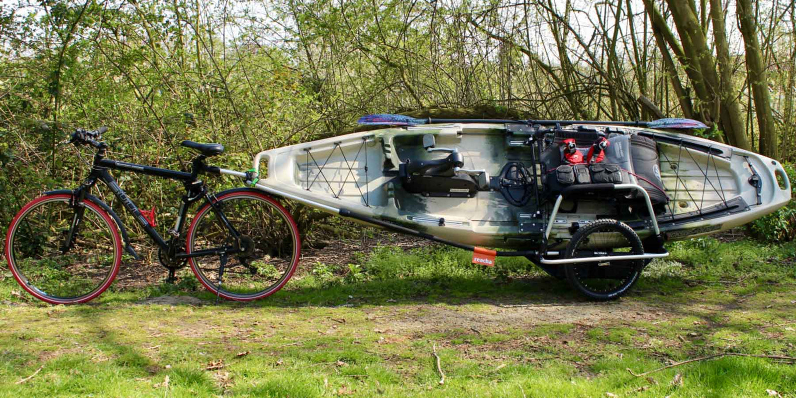 https://reacha.fr/cdn/shop/articles/bike-trailer-for-fishing-kayaks_e075a0cb-b84e-4e86-98de-610f2ef7b71f_1600x.jpg?v=1606513388
